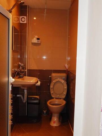 Фото номера Трехместный номер с балконом Гостевой дом Guest House Zdravets г. Сапарева-Баня 6