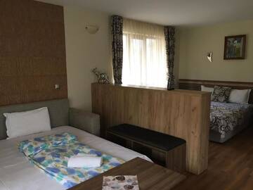 Фото номера Номер-студио Делюкс с кроватью размера &quot;king-size&quot; Гостевой дом Kot Garden Guest House г. Сапарева-Баня 18