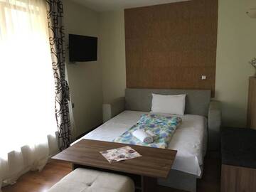 Фото номера Номер-студио Делюкс с кроватью размера &quot;king-size&quot; Гостевой дом Kot Garden Guest House г. Сапарева-Баня 19