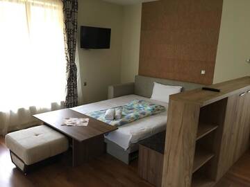 Фото номера Номер-студио Делюкс с кроватью размера &quot;king-size&quot; Гостевой дом Kot Garden Guest House г. Сапарева-Баня 2