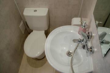 Фото номера Трехместный номер с балконом Гостевой дом Guest House ViA г. Сапарева-Баня 5