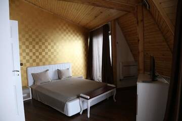 Фото номера Дом с 5 спальнями Гостевой дом Holiday House Kubrat г. Сапарева-Баня 35