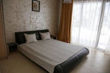 Фото номера Дом с 5 спальнями Гостевой дом Holiday House Kubrat г. Сапарева-Баня 5