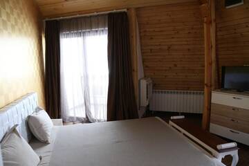 Фото номера Дом с 5 спальнями Гостевой дом Holiday House Kubrat г. Сапарева-Баня 15