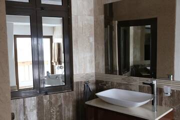 Фото номера Дом с 5 спальнями Гостевой дом Holiday House Kubrat г. Сапарева-Баня 13