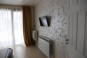 Фото номера Дом с 5 спальнями Гостевой дом Holiday House Kubrat г. Сапарева-Баня 38