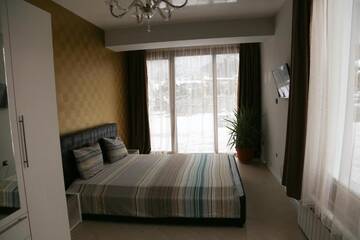 Фото номера Дом с 5 спальнями Гостевой дом Holiday House Kubrat г. Сапарева-Баня 40
