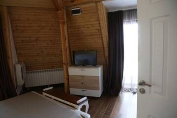 Фото номера Дом с 5 спальнями Гостевой дом Holiday House Kubrat г. Сапарева-Баня 54