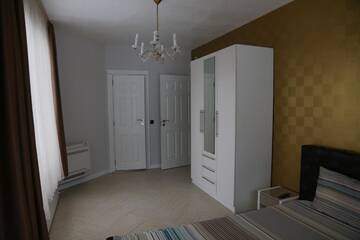 Фото номера Дом с 5 спальнями Гостевой дом Holiday House Kubrat г. Сапарева-Баня 55