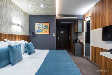 Фото номера Двухместный номер Делюкс с 1 кроватью Отель 103 Degrees Hotel &amp; Spa г. Сапарева-Баня 2