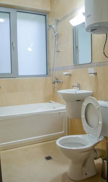 Фото номера Трехместный номер с собственной ванной комнатой Гостевой дом Guest House Dinevi г. Сапарева-Баня 3